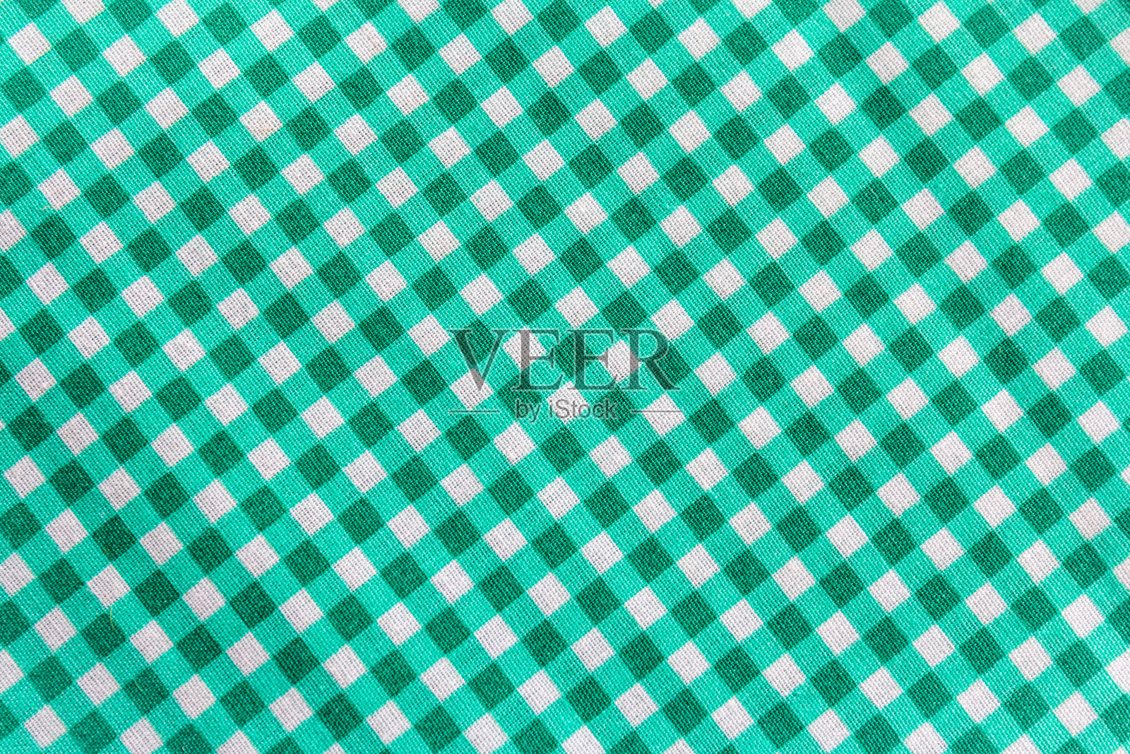 经典的绿色格子织物或桌布背景照片摄影图片