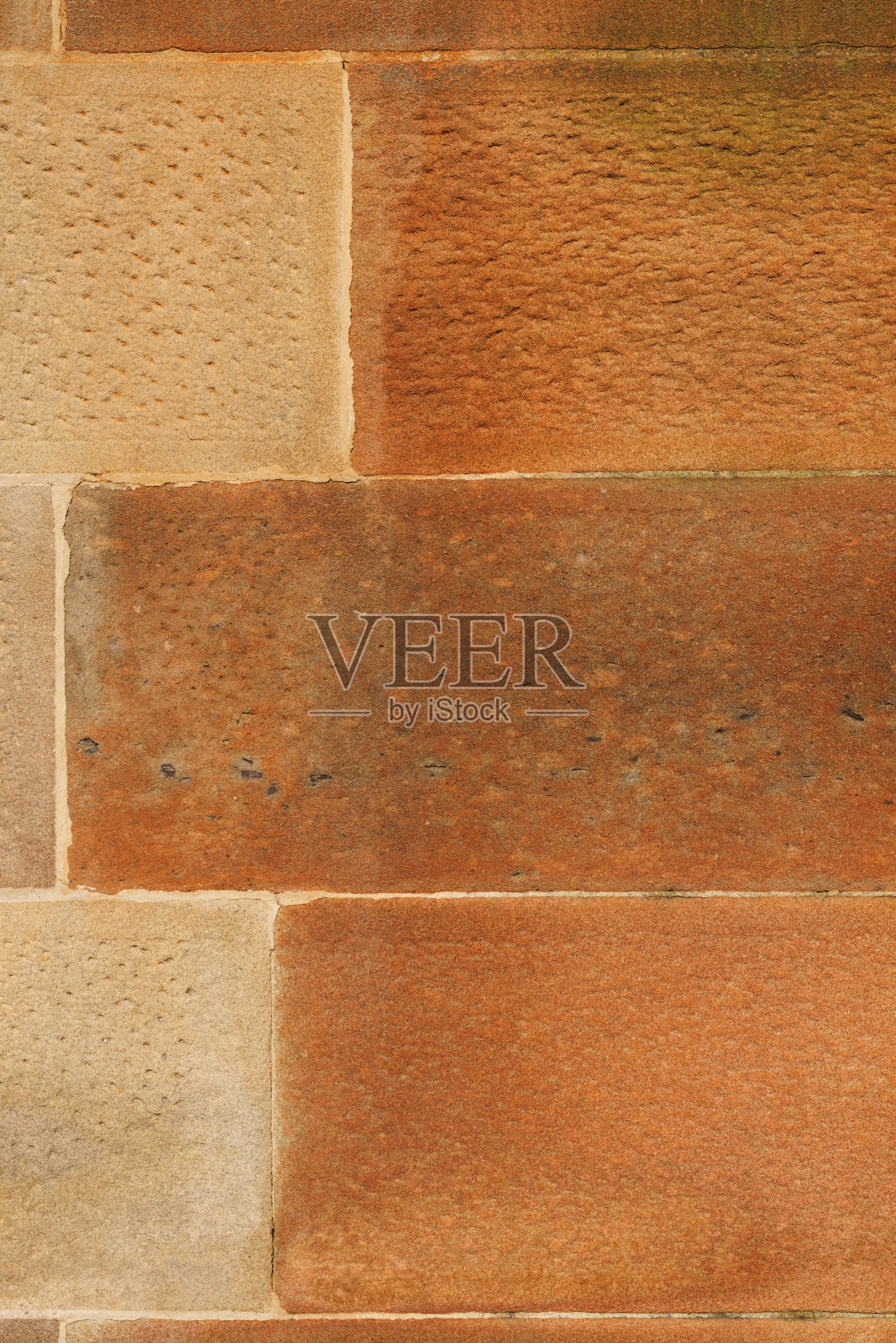 旧砂岩砌块墙的一部分照片摄影图片