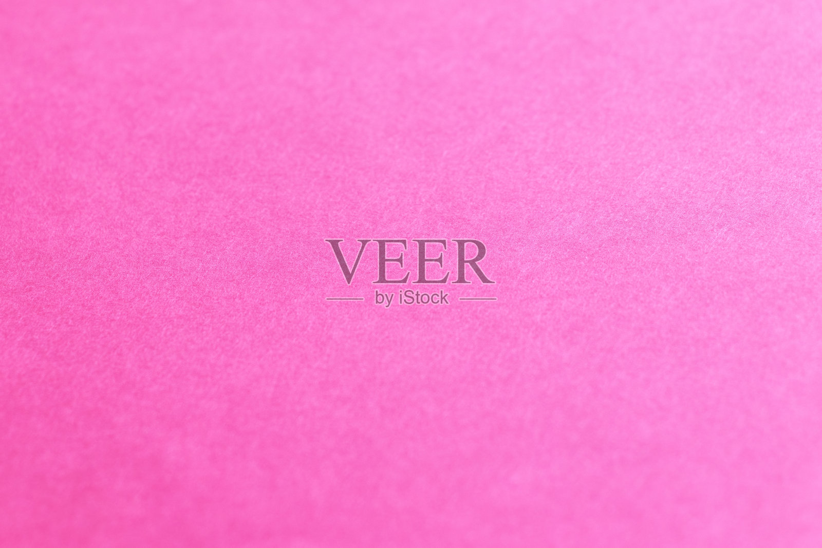 表面纹理明亮的粉红色纸张照片摄影图片