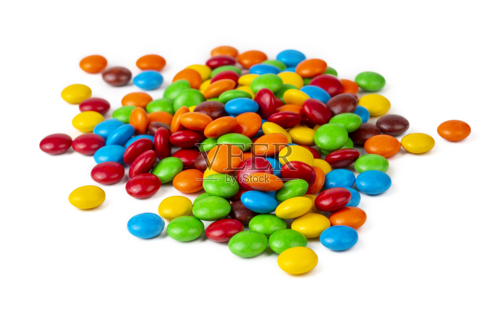 一堆彩虹彩色糖果涂层巧克力按钮孤立照片摄影图片