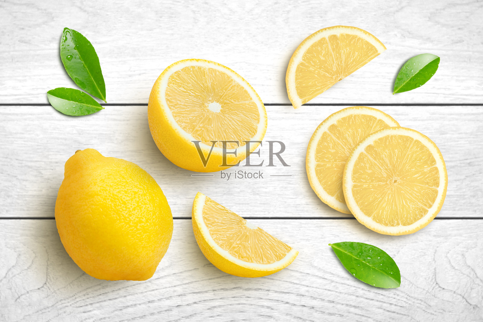 有绿叶分离的柠檬照片摄影图片