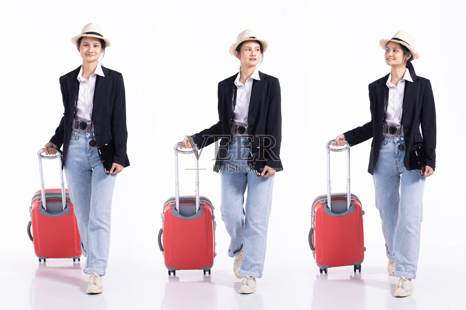 全程20多岁的年轻Mix种族旅行家导游导游女士，带着行李向前走左右照片摄影图片