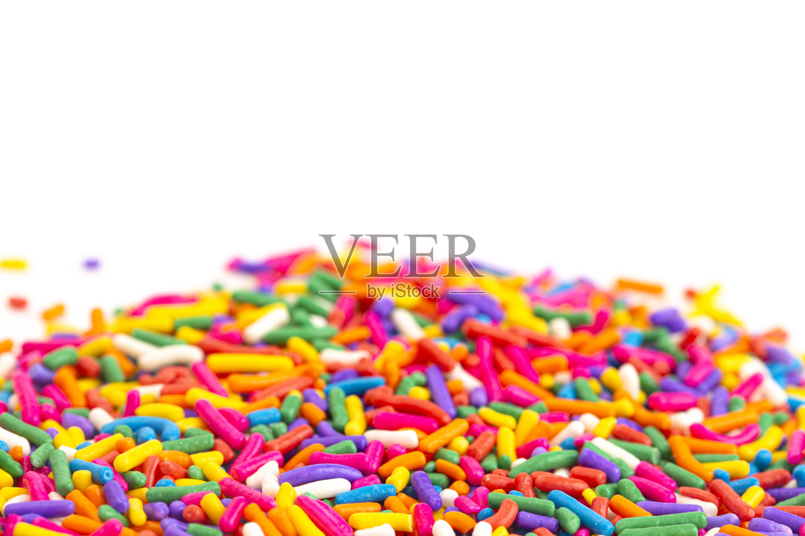 在白色背景上隔离的彩虹洒水照片摄影图片