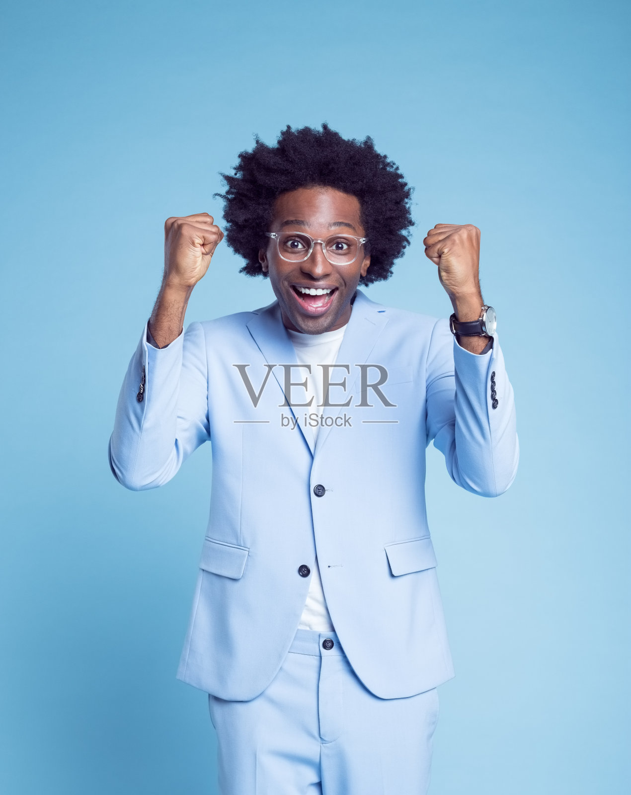 快乐的商人握紧拳头照片摄影图片