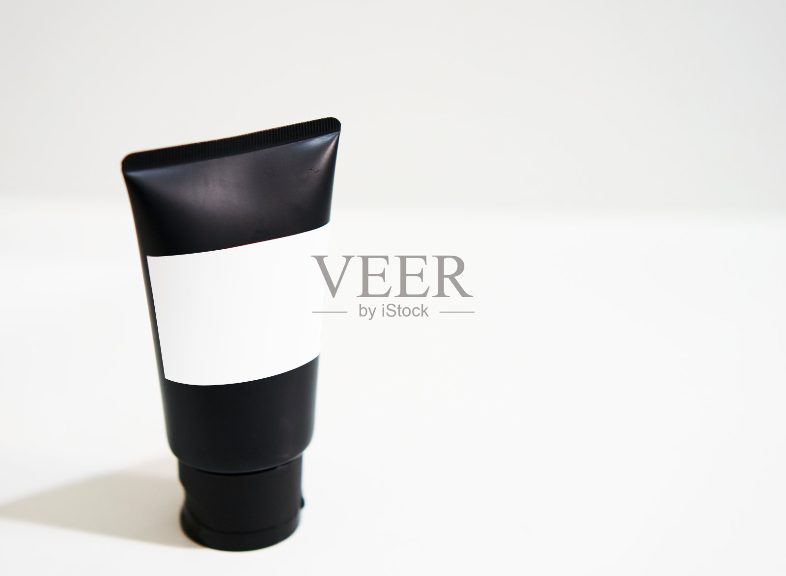 黑色化妆品模型霜管白色与标签照片摄影图片