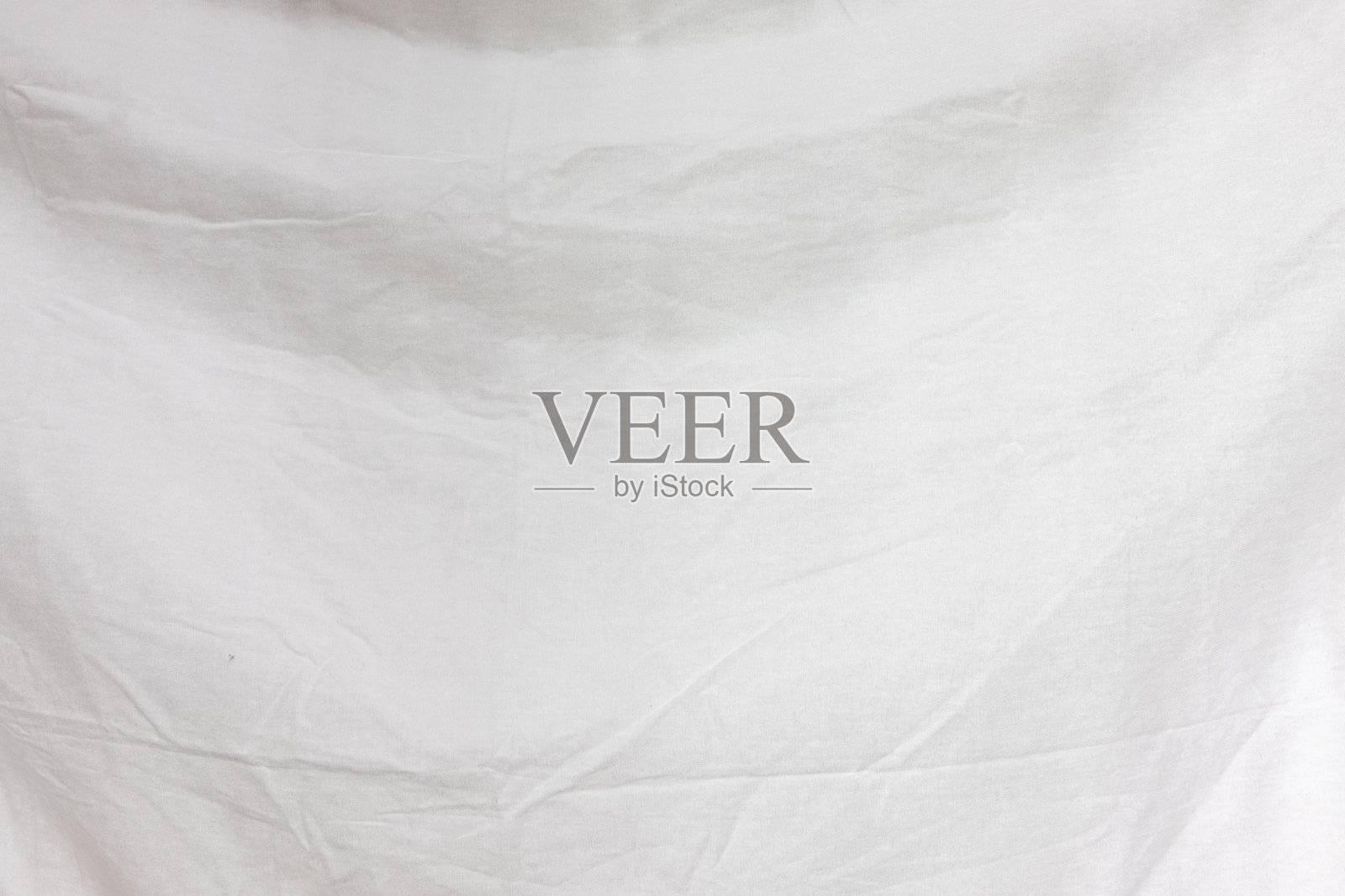 柔软的白色床单表面照片摄影图片