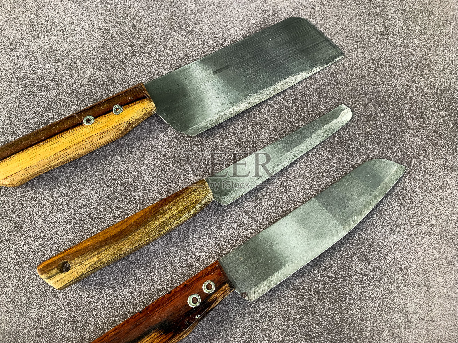 木柄的小刀。各种花样的刀照片摄影图片