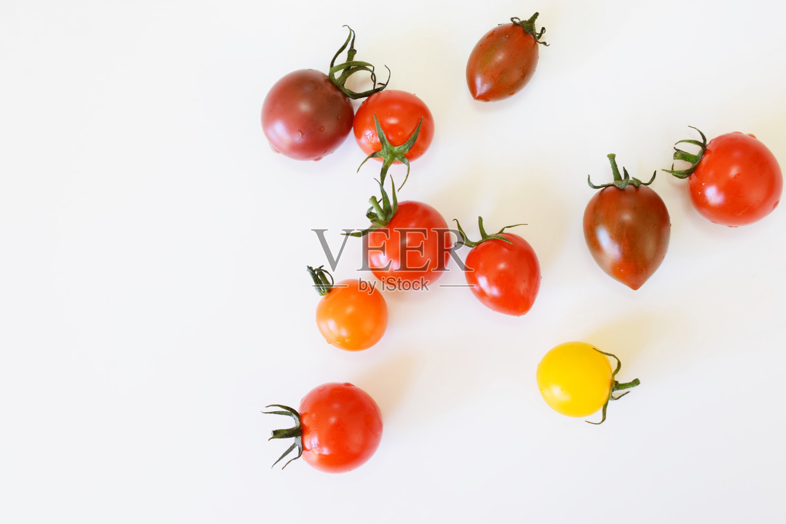 色彩鲜艳的樱桃番茄照片摄影图片