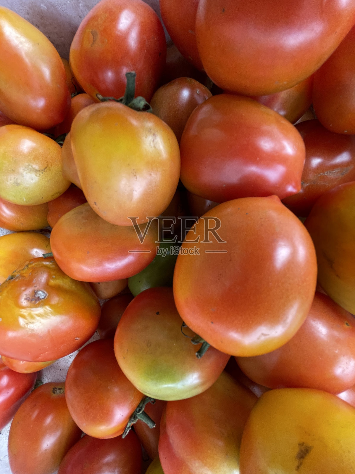 新鲜的红番茄很适合做背景色。红番茄群照片摄影图片