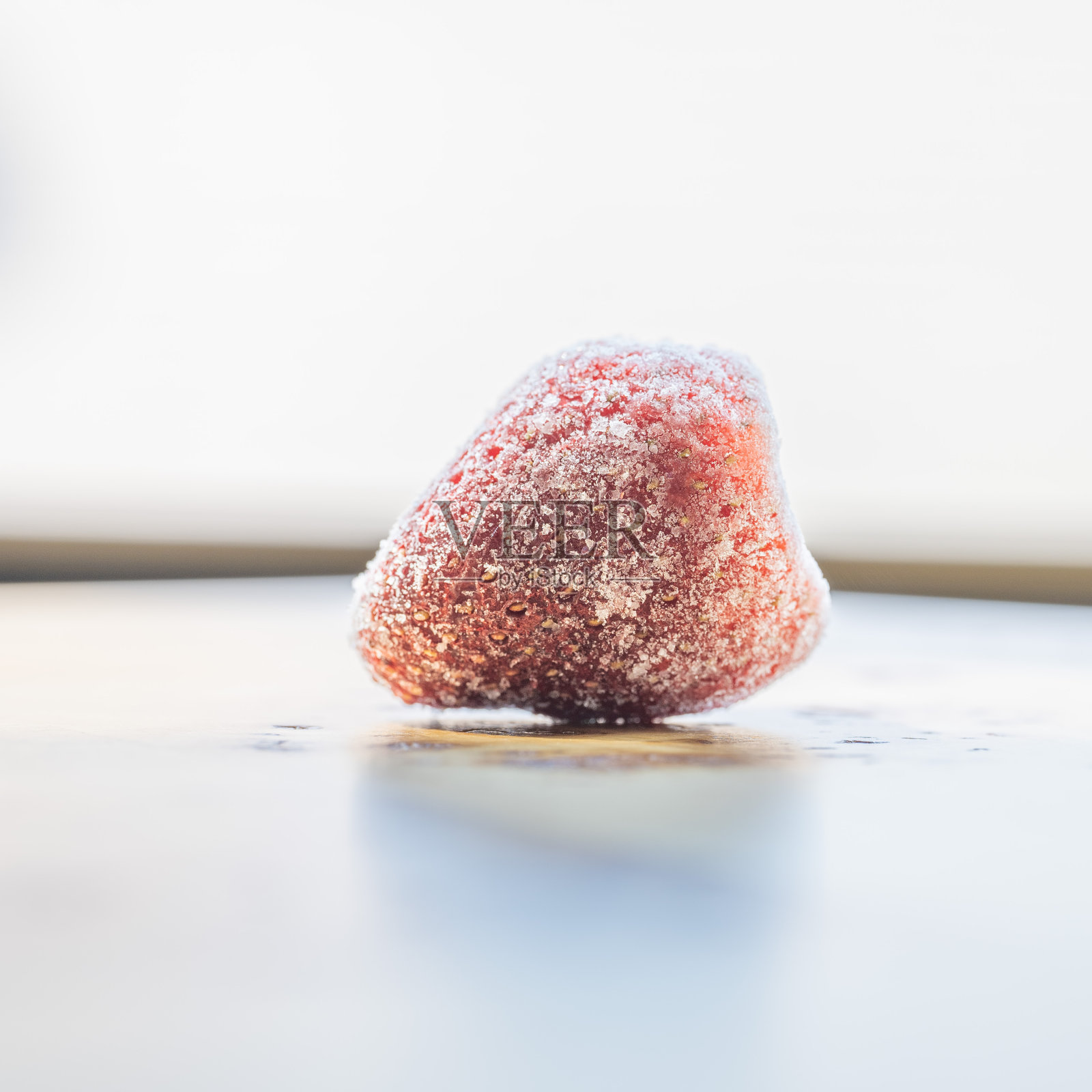 冰冻草莓的微距照片照片摄影图片