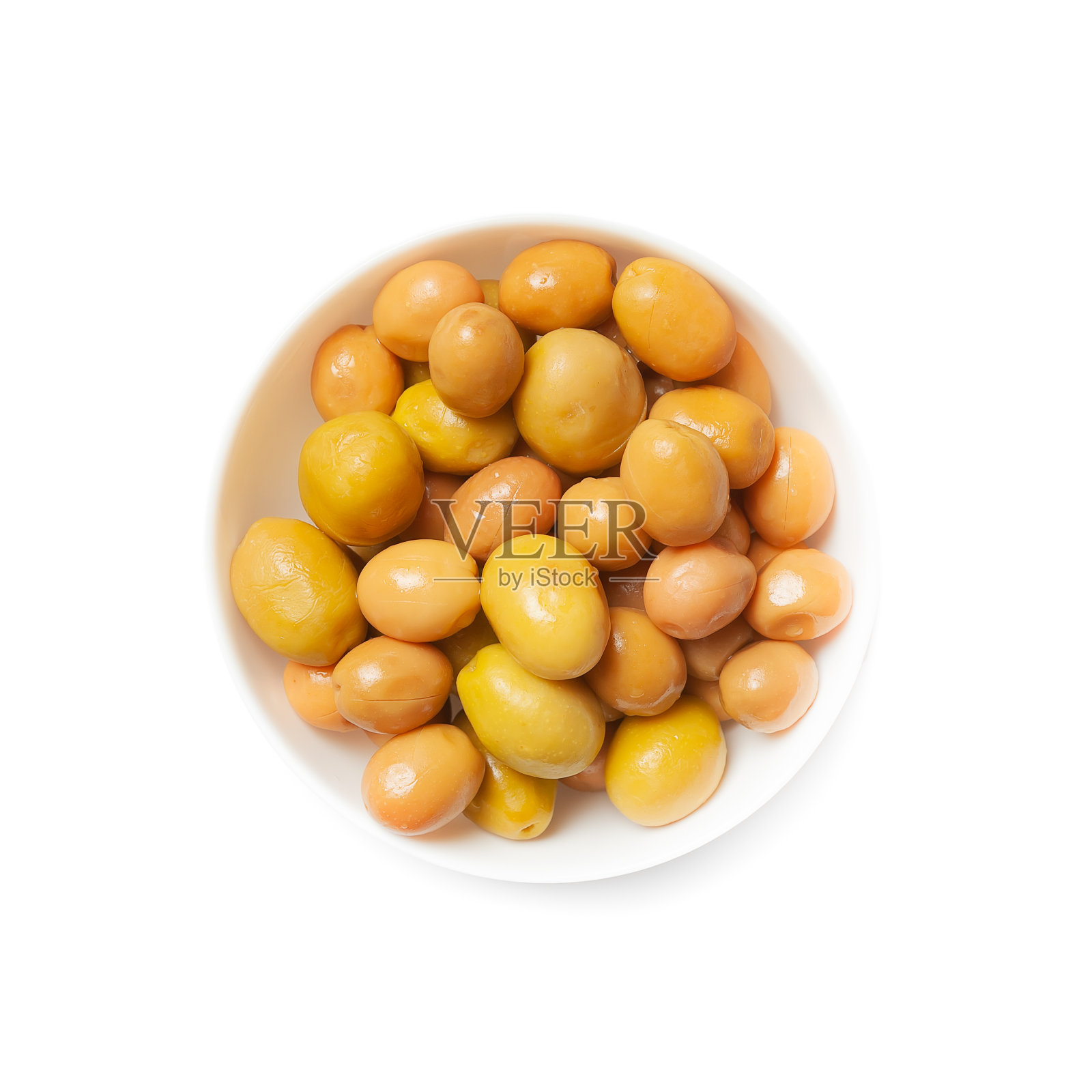 大的绿色橄榄在一个白色的碗，孤立，从上面看照片摄影图片