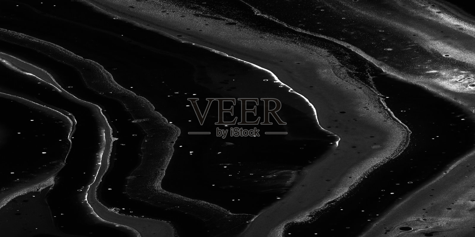 黑色的大理石。天然黑色大理石的纹理。黑色的大理石。照片摄影图片