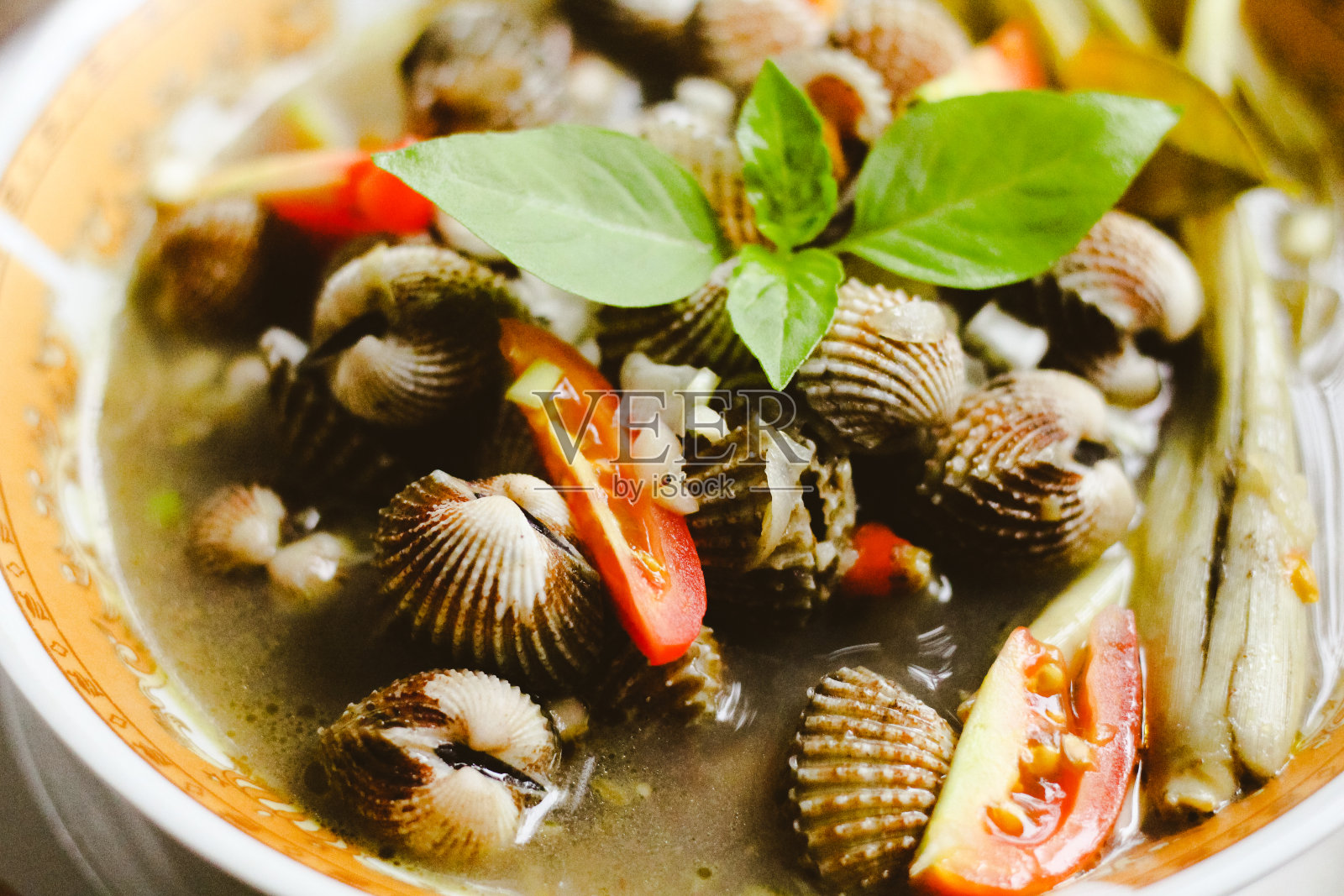 用肉汁煮的蛤血照片摄影图片