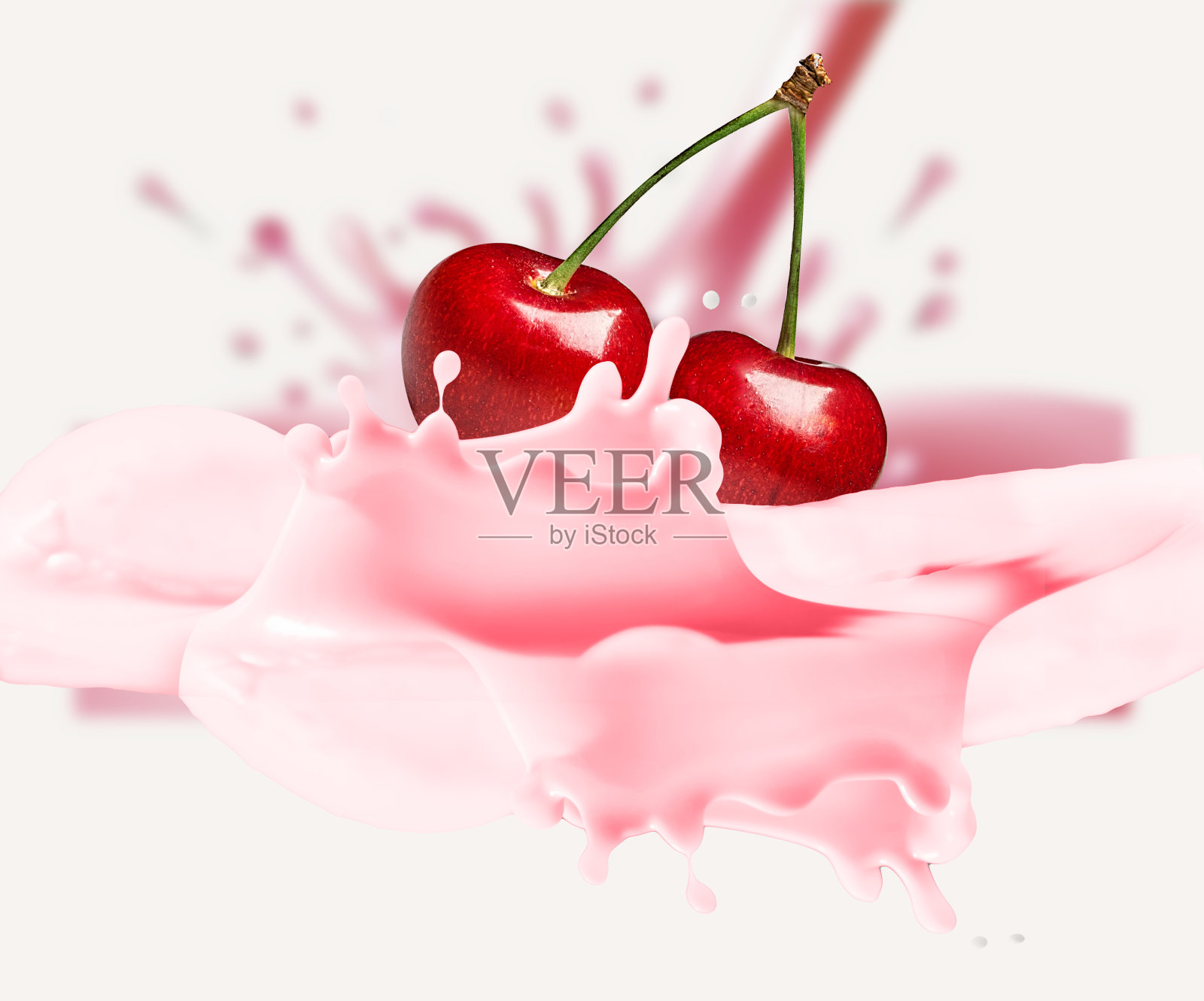 樱桃掉进了牛奶里。飞溅隔离在白色照片摄影图片