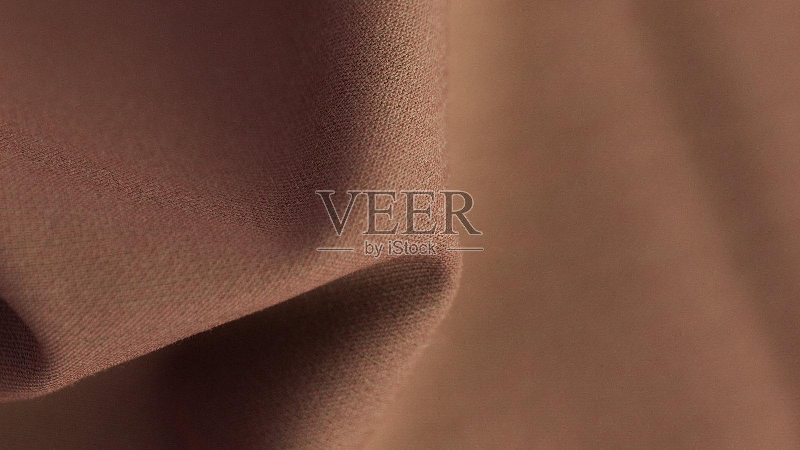 柔软和流动的织物细节。照片摄影图片