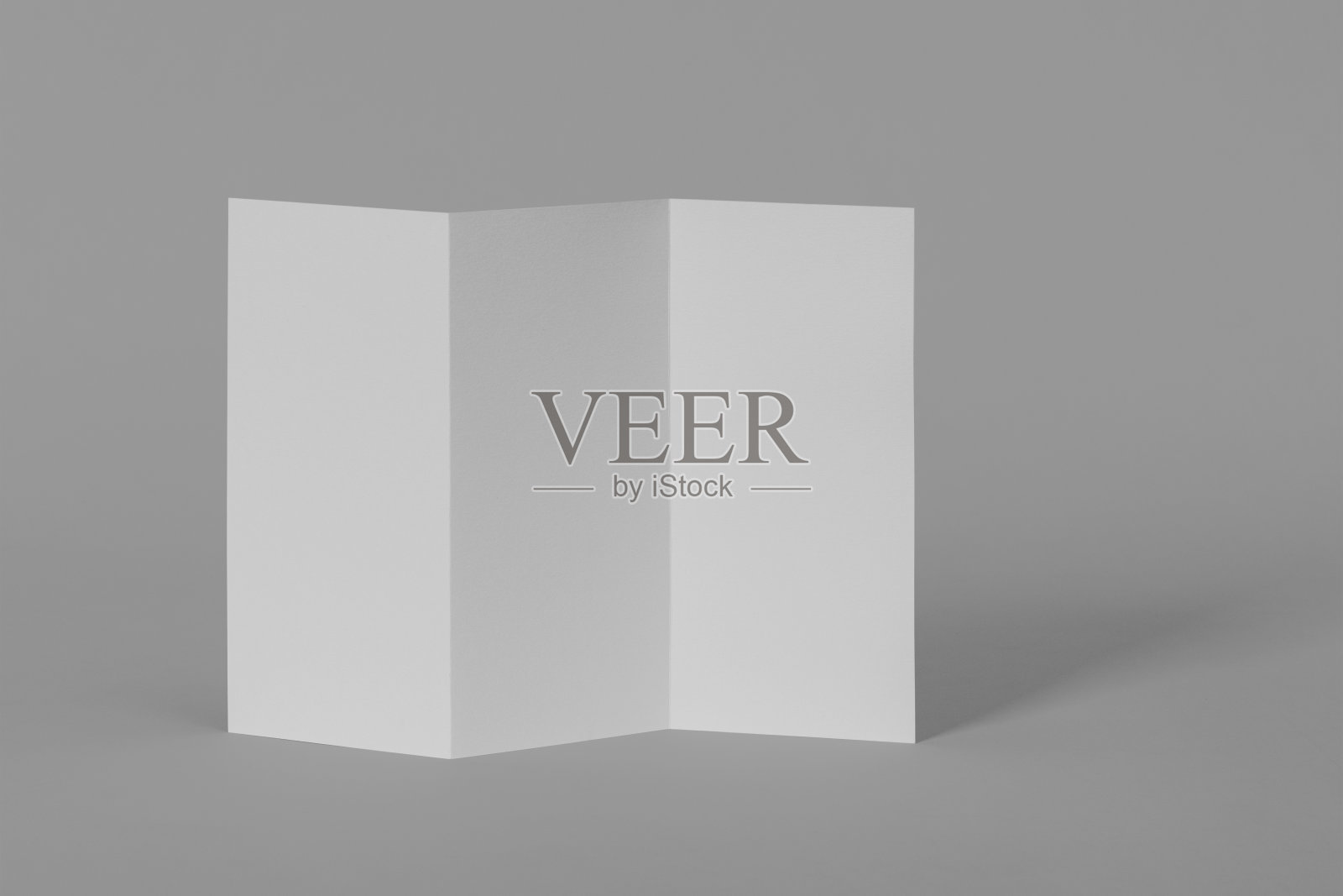 A4大小的三折的小册子模型，为您的标志或图形设计拷贝空间照片摄影图片