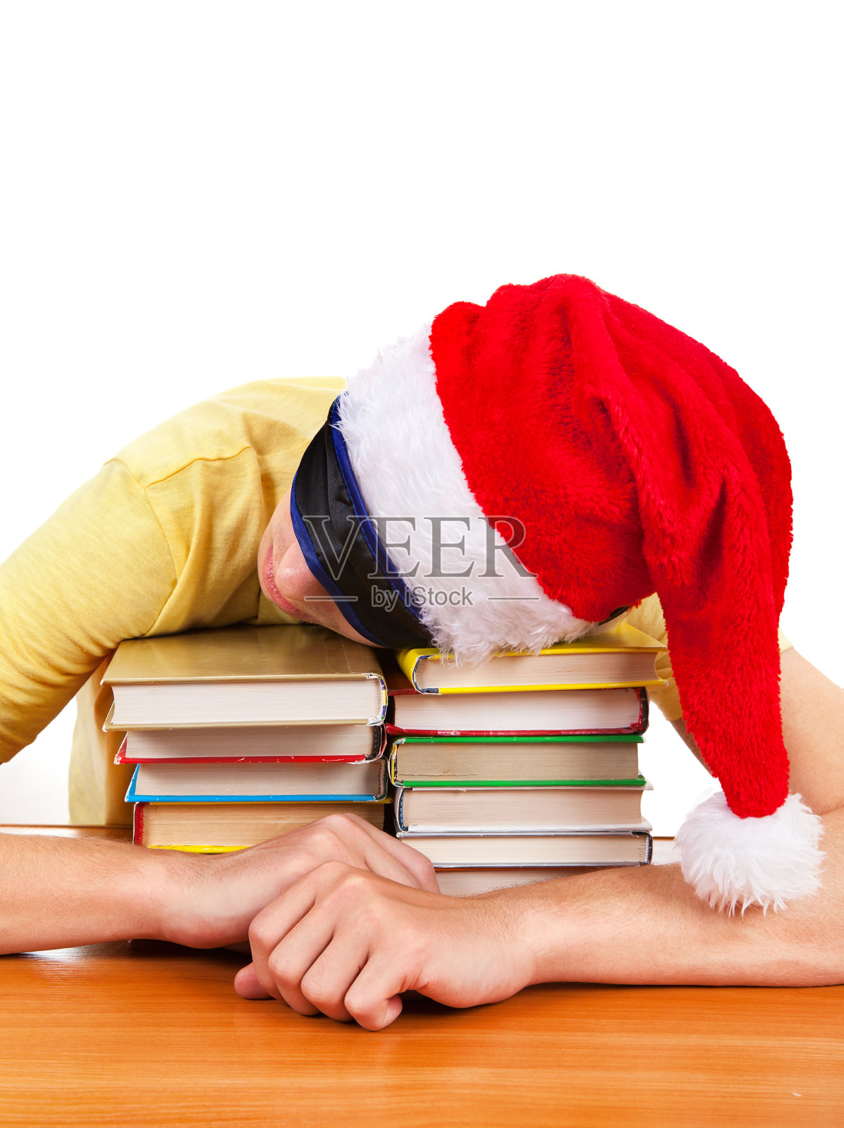 学生睡在书本上照片摄影图片