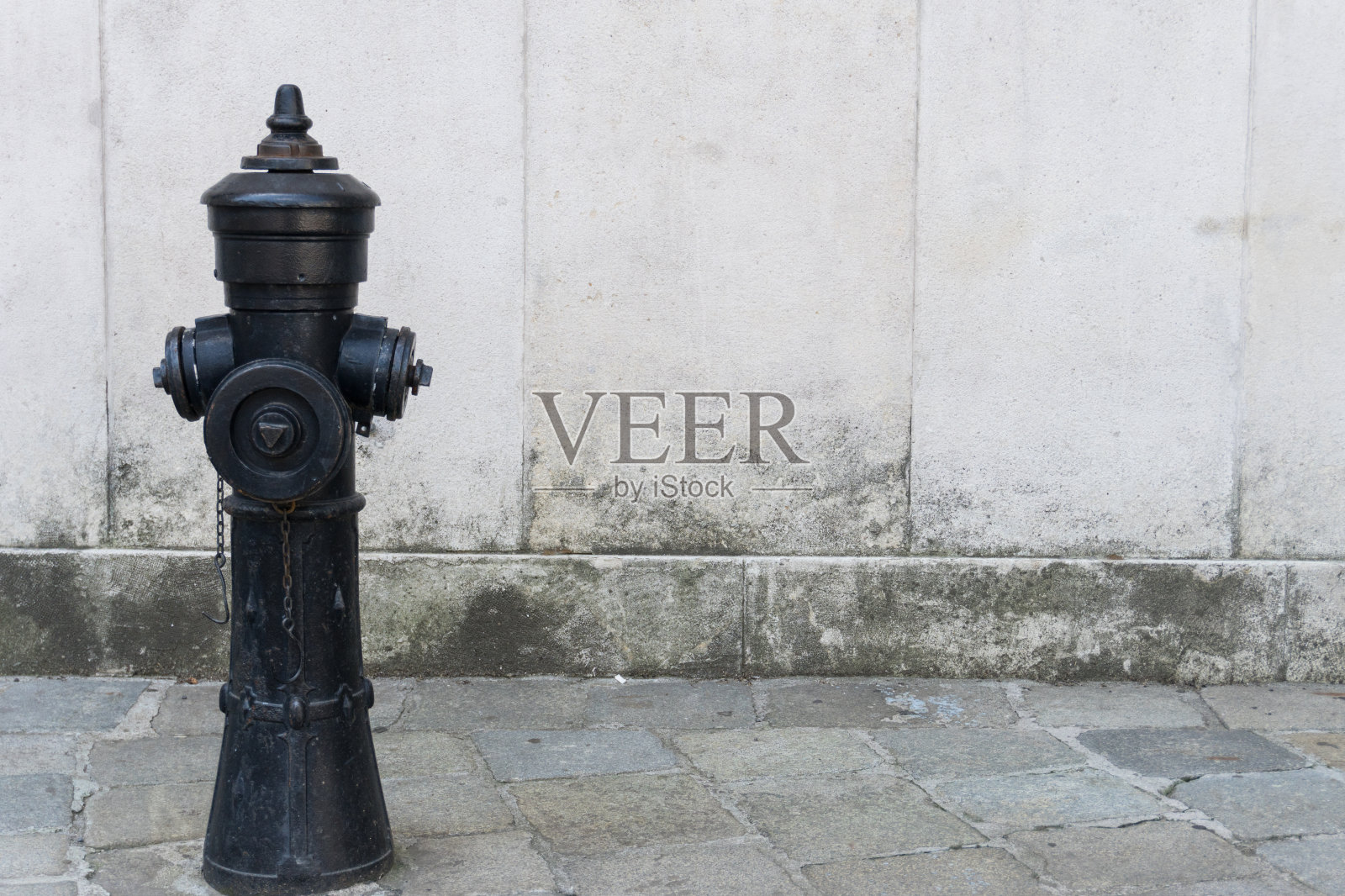 消防栓鹅卵石街道外墙留白照片摄影图片