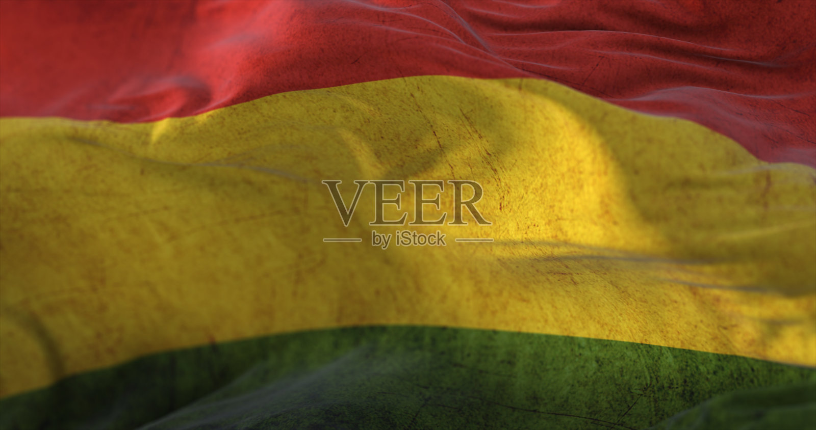 旧玻利维亚国旗在风中飘扬照片摄影图片