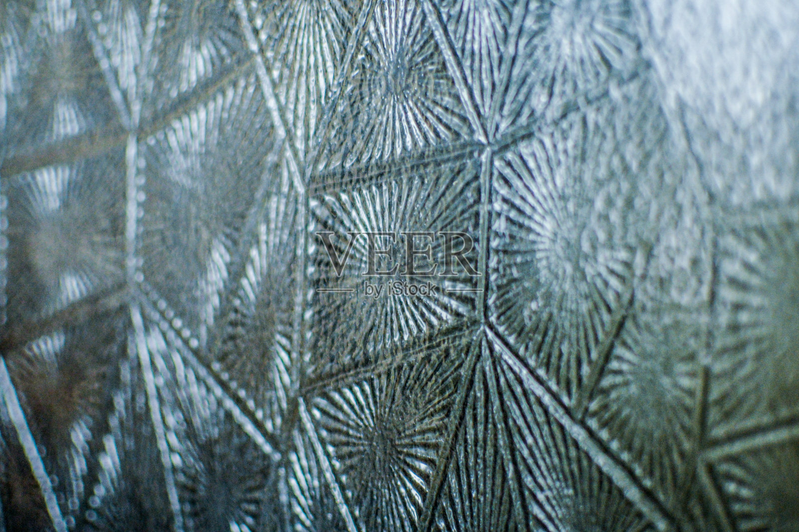 纹理玻璃。有图案的透明玻璃照片摄影图片