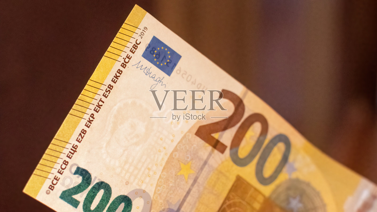 概念构思:200欧元纸币的抽象背景照片摄影图片