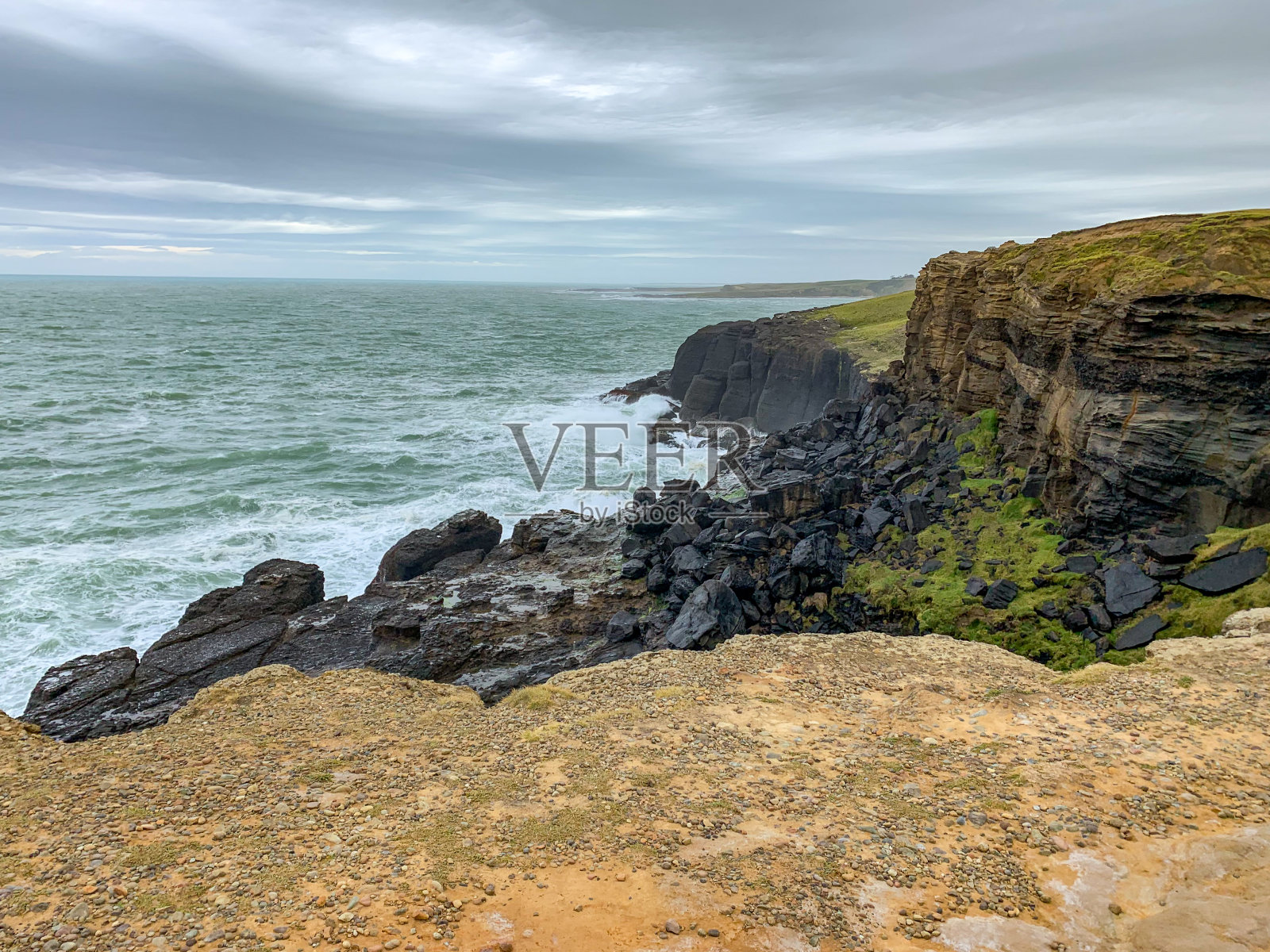 新西兰南岛最南端的山坡点照片摄影图片