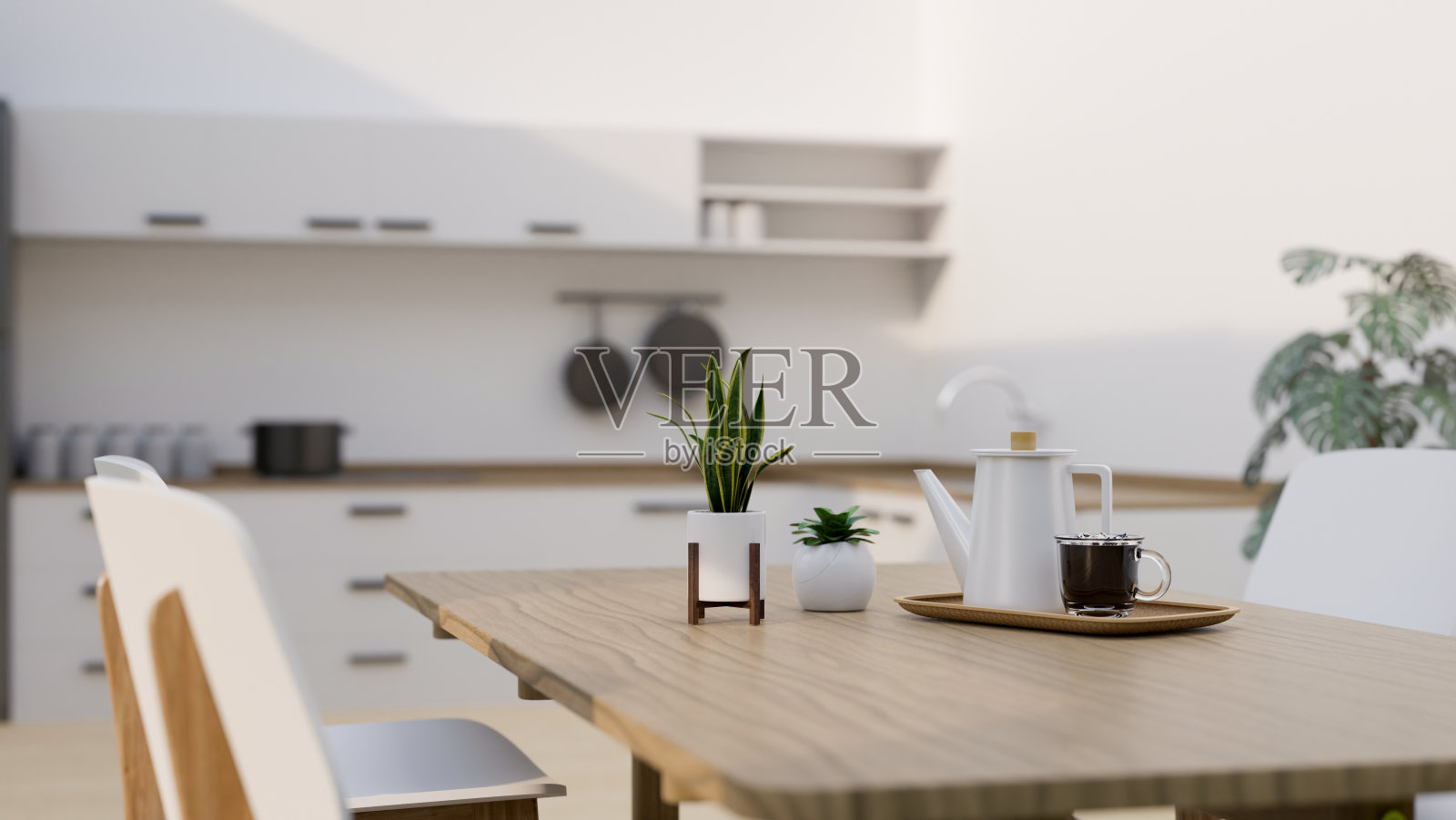 现代简约的木制餐桌装饰在现代简约的白色餐厅和厨房照片摄影图片