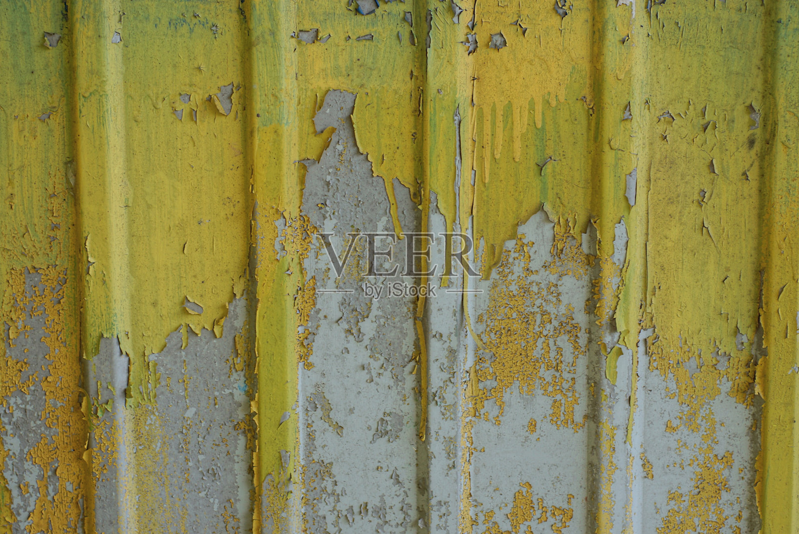 灰黄色的纹理来自破旧的旧金属墙照片摄影图片
