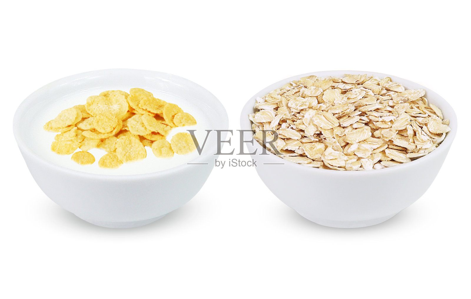 白色背景的玉米片和燕麦片。照片摄影图片
