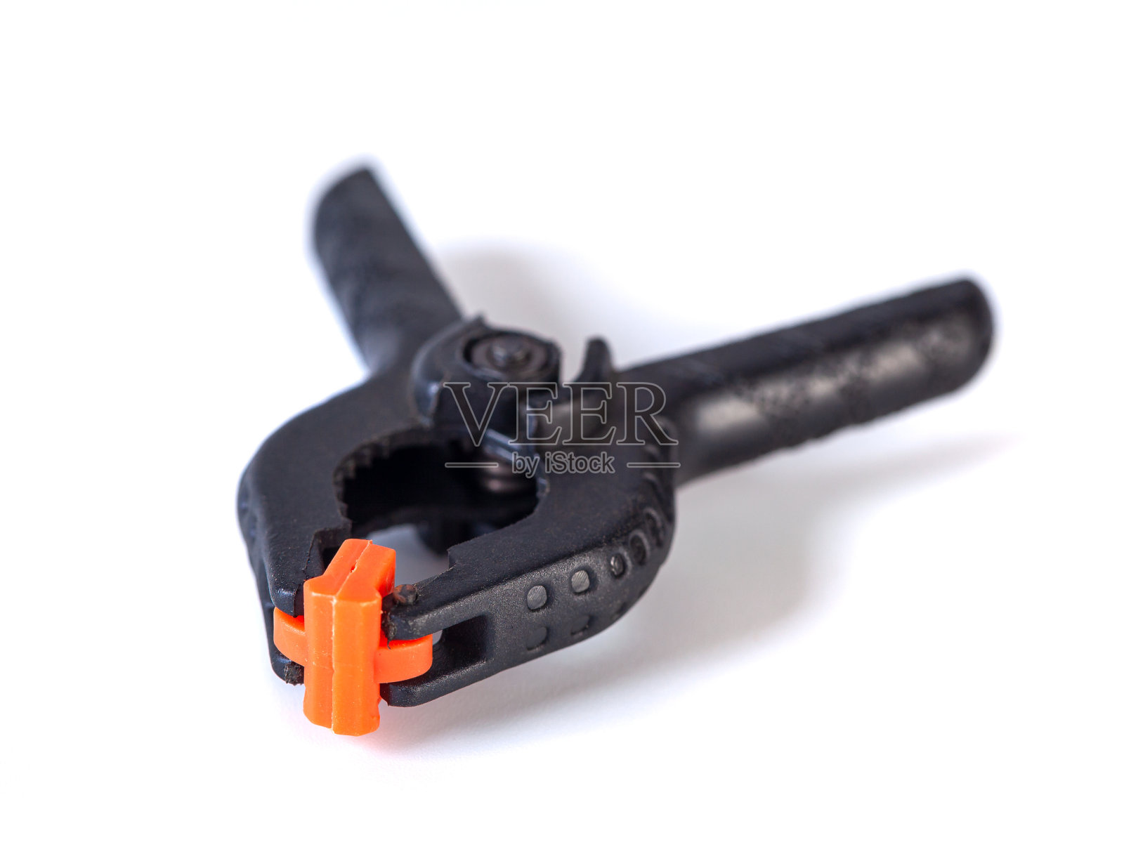 照相馆用的塑胶夹，夹住背景及其他物件照片摄影图片