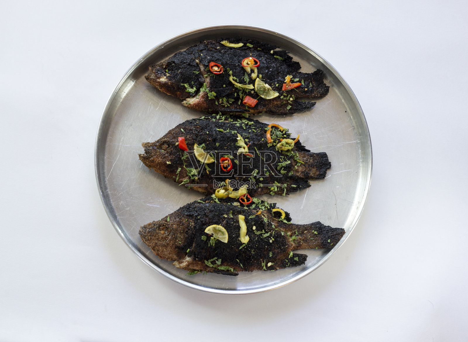 白色烤埃及罗非鱼照片摄影图片