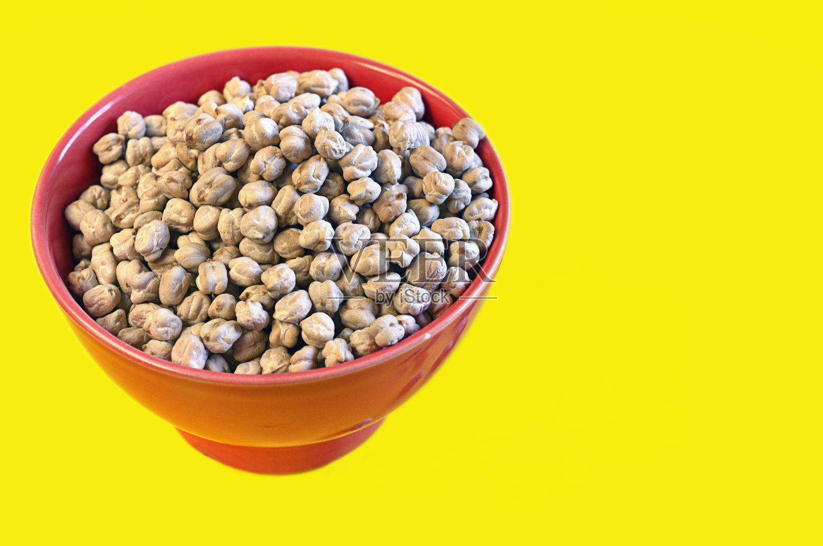 非常美味的来自西班牙花园的有机蜂蜜鹰嘴豆。照片摄影图片