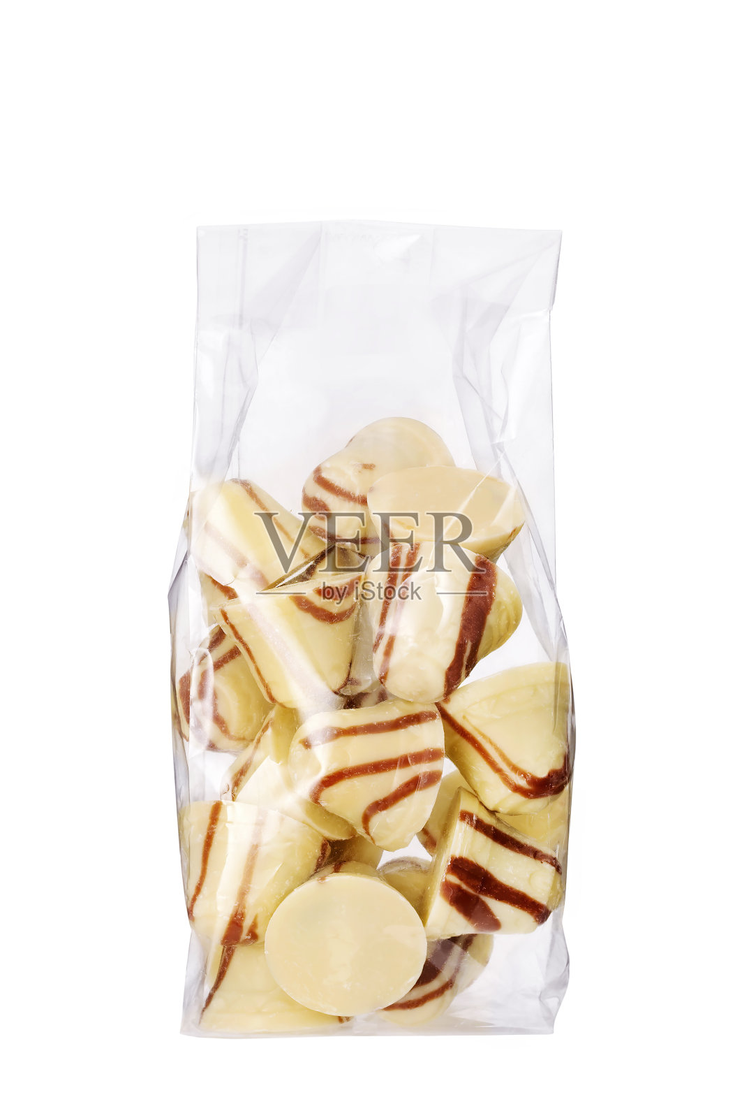 钟形巧克力夹心夹心在塑料袋上隔离白色照片摄影图片