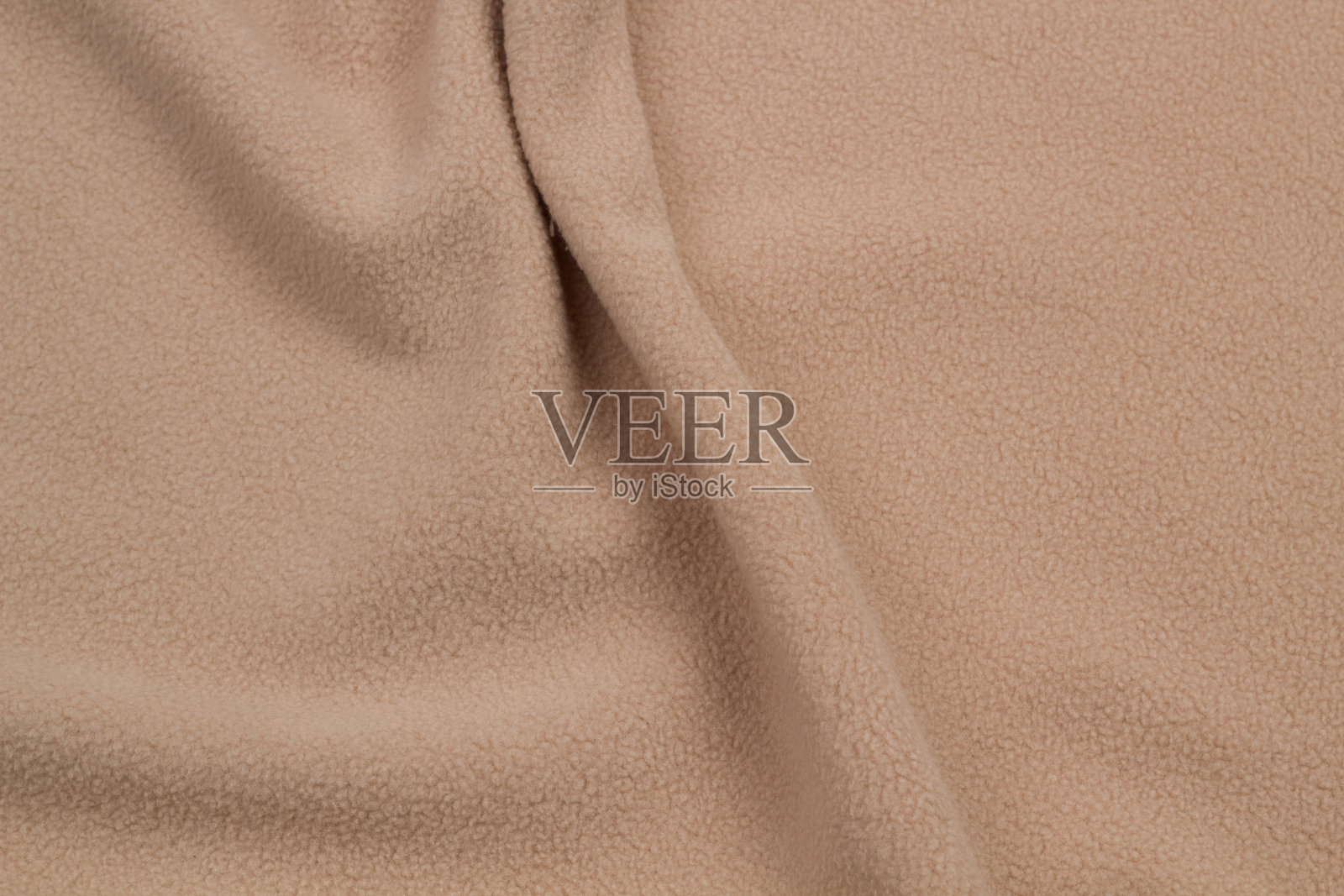 抓绒面料俯视图。纺织羊毛床罩的质地。照片摄影图片