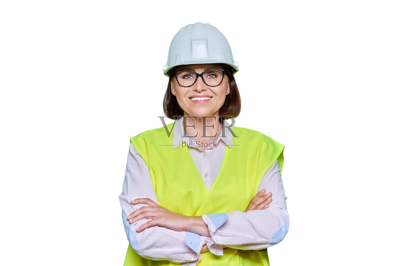 在白色背景的保护硬帽子背心女性产业工人的肖像照片摄影图片