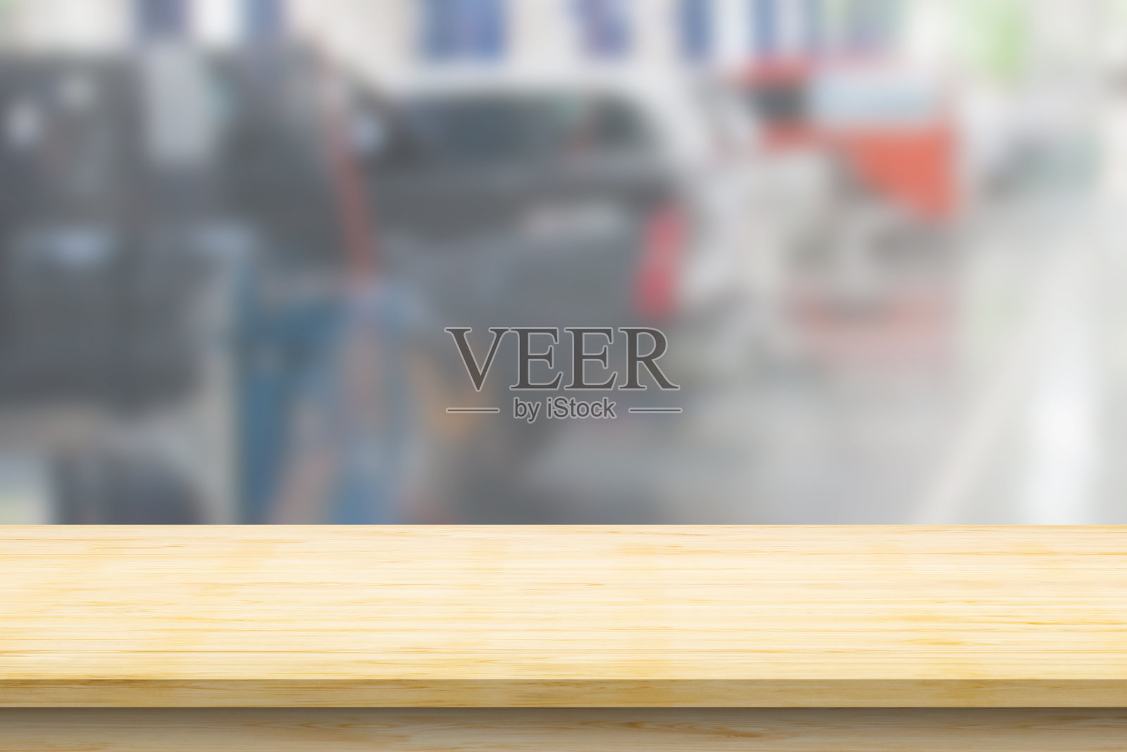 空木桌面与汽车服务中心汽车维修车间模糊的背景照片摄影图片