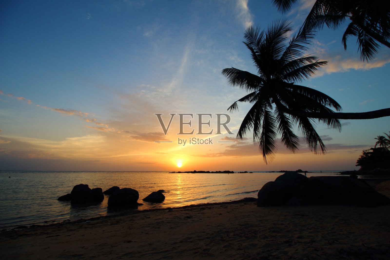 日落高潘甘海滩照片摄影图片