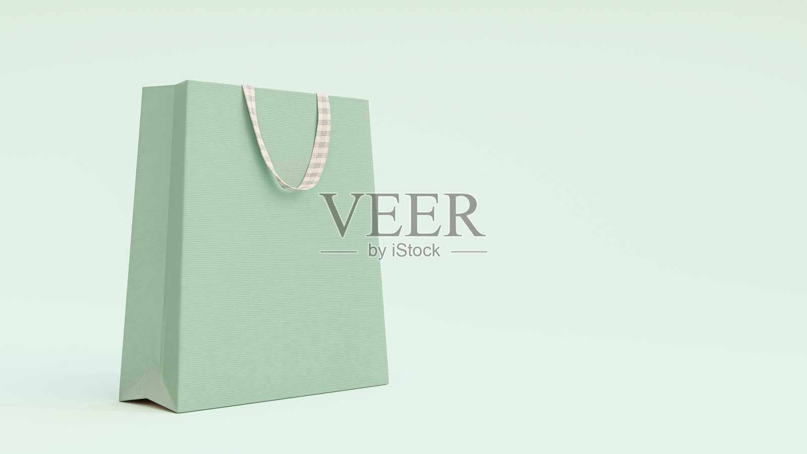纸购物袋模型绿色粉彩。照片摄影图片