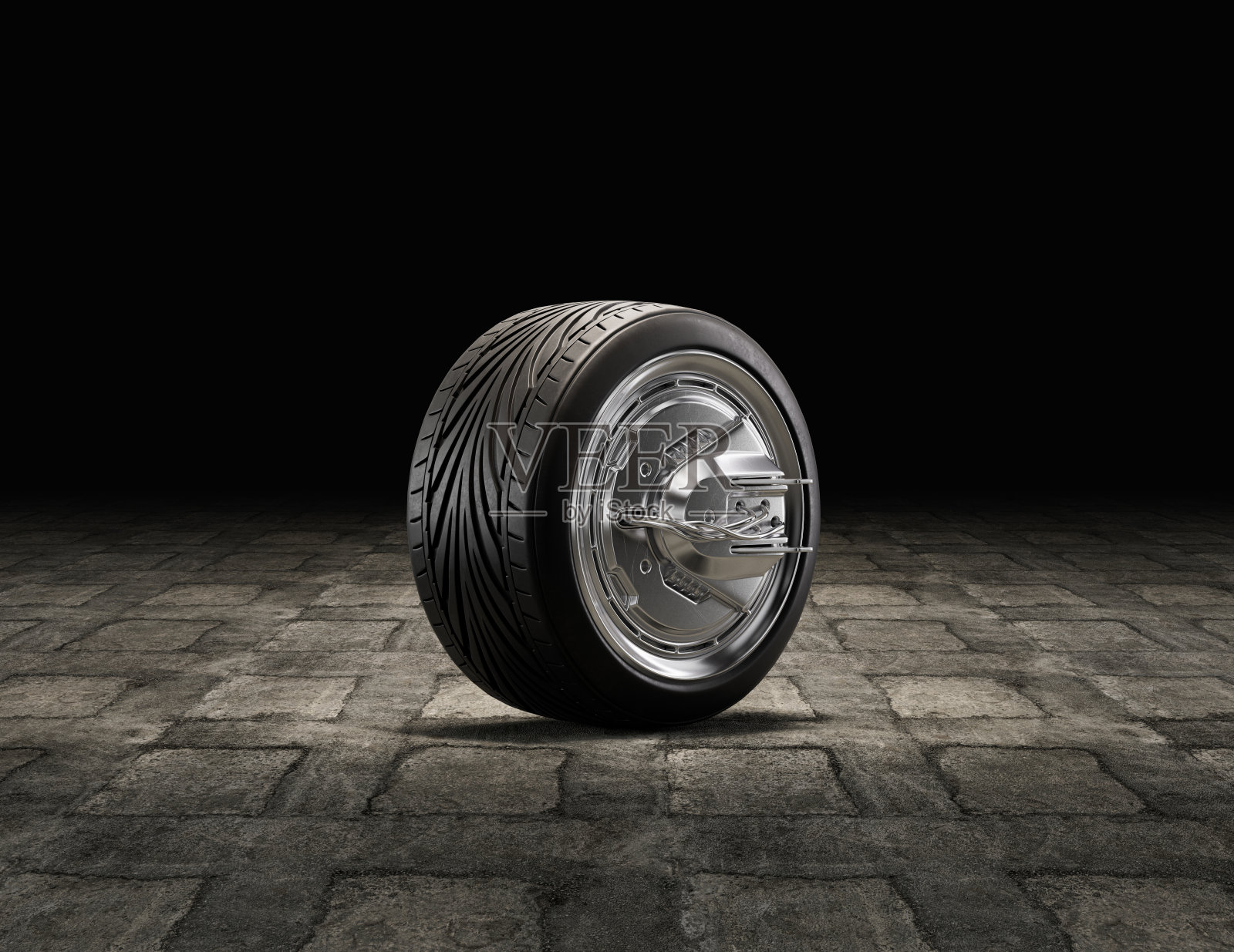 车库地板上的一个汽车轮胎。从侧面看，橡胶轮胎有光泽的铬轮辋。三维渲染照片摄影图片