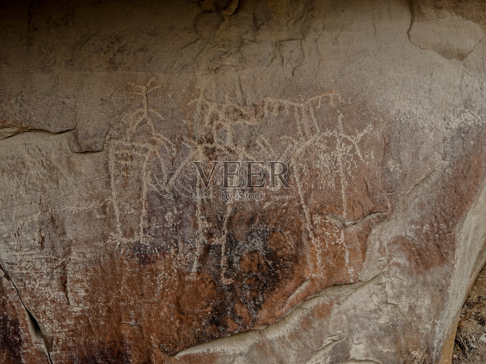 古老的岩石雕刻。弗里蒙特文化,犹他州。照片摄影图片