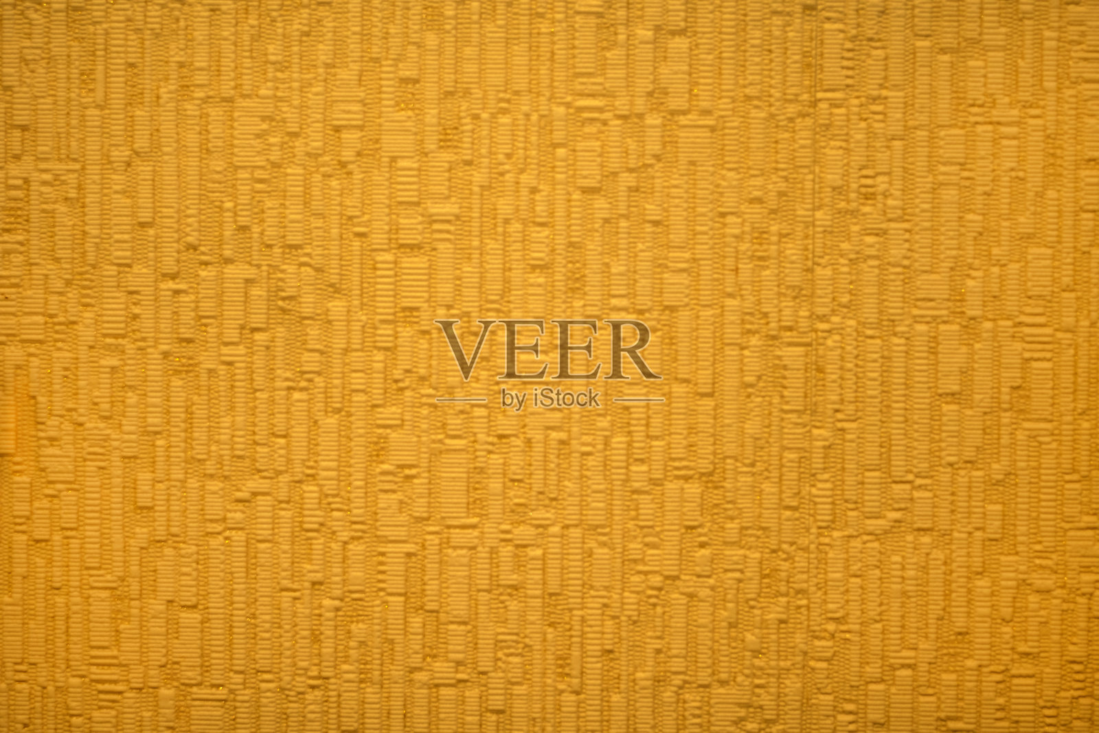 黄色背景与画布纹理在柔和的颜色，与铭文的地方。照片摄影图片