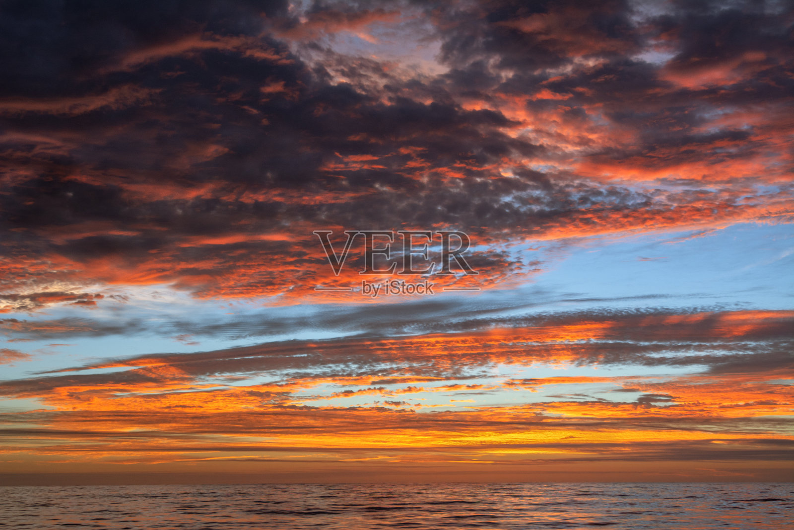 壮观的海洋日落照片摄影图片