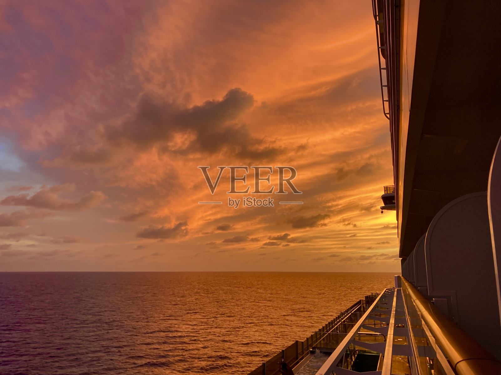 夕阳从加勒比海照片摄影图片