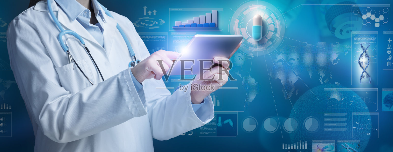 医药背景的医生触摸数字平板。照片摄影图片