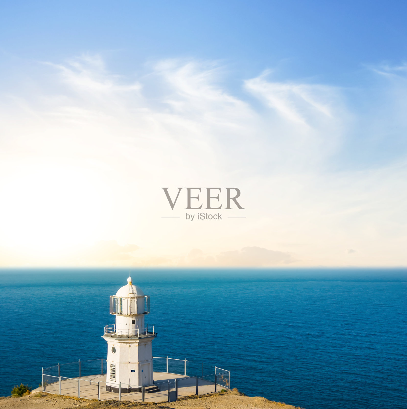 灯塔在翡翠海岬的日出照片摄影图片