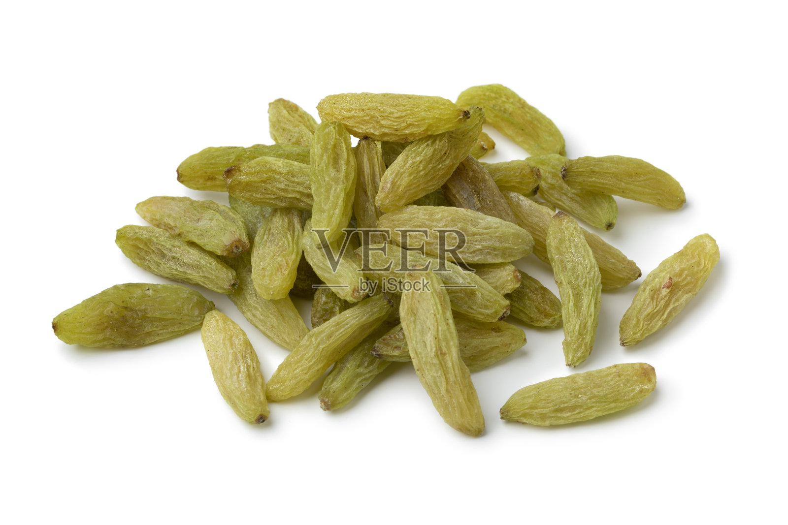 白色背景下的一堆绿色阿富汗葡萄干照片摄影图片