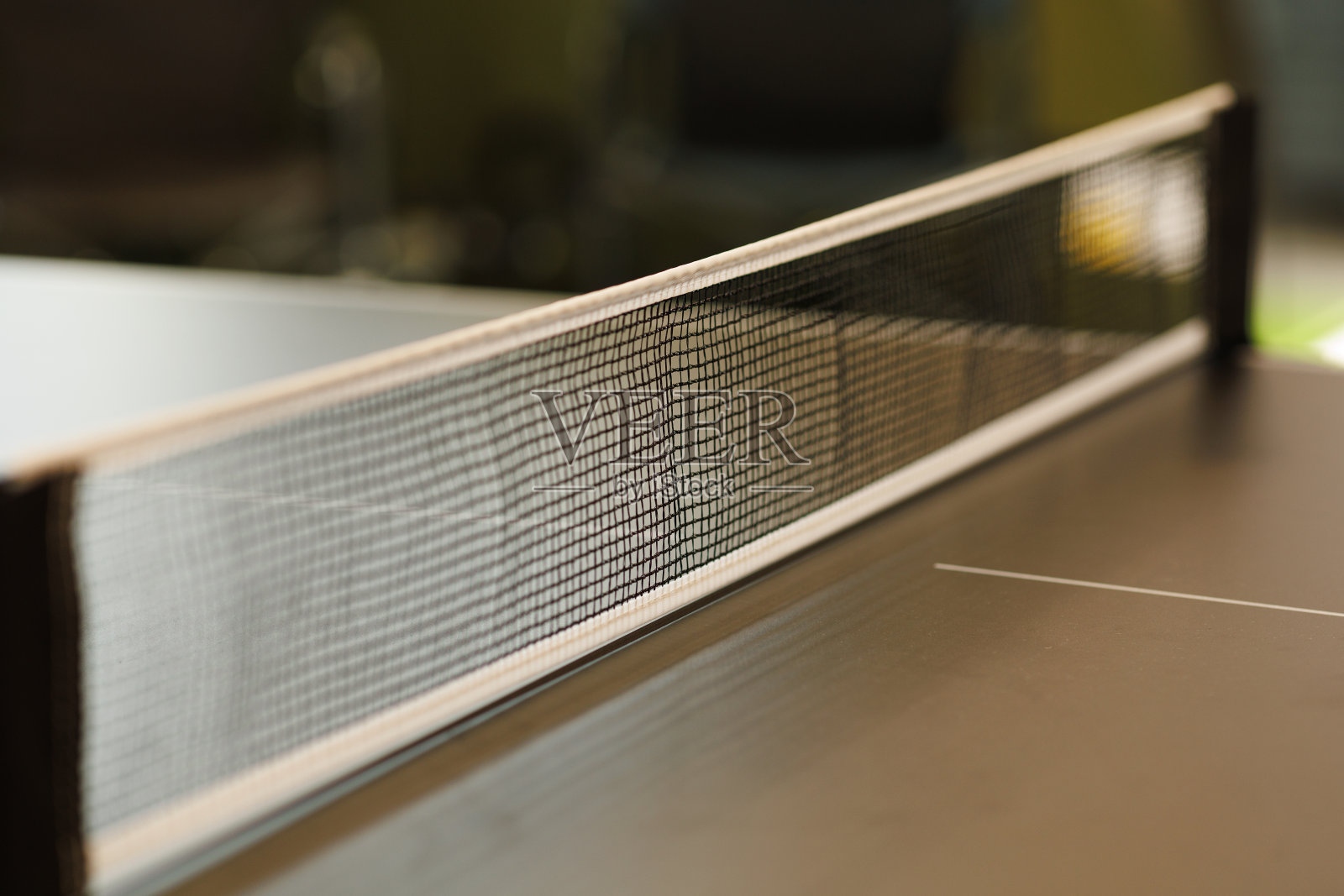 乒乓球网在游戏台上展开照片摄影图片