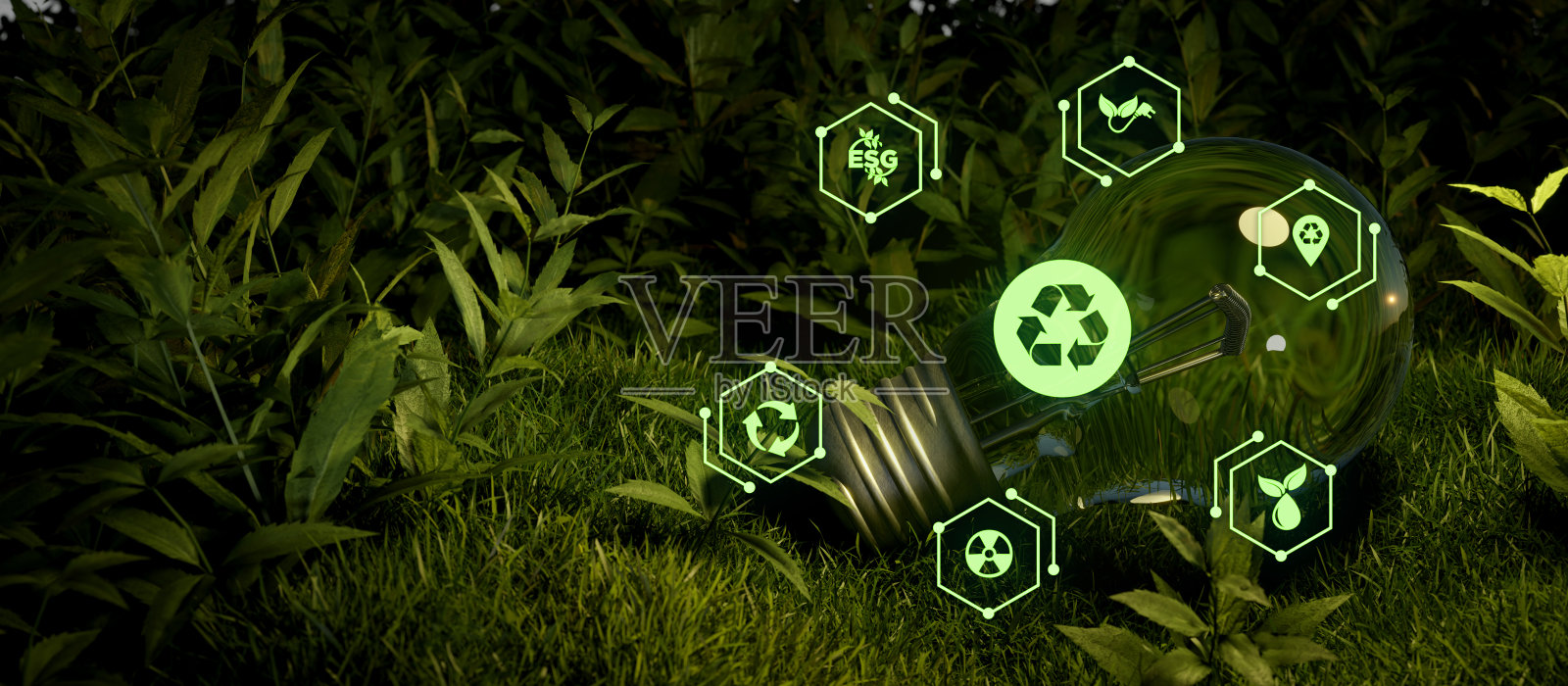 环保回收灯泡上的绿色环保生命符号与自然背景中其他资源的连接概念照片摄影图片