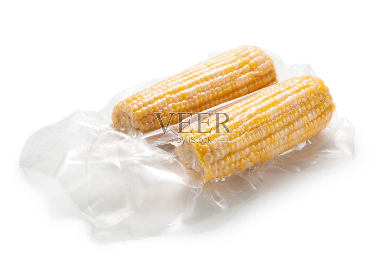真空包装中的玉米芯照片摄影图片
