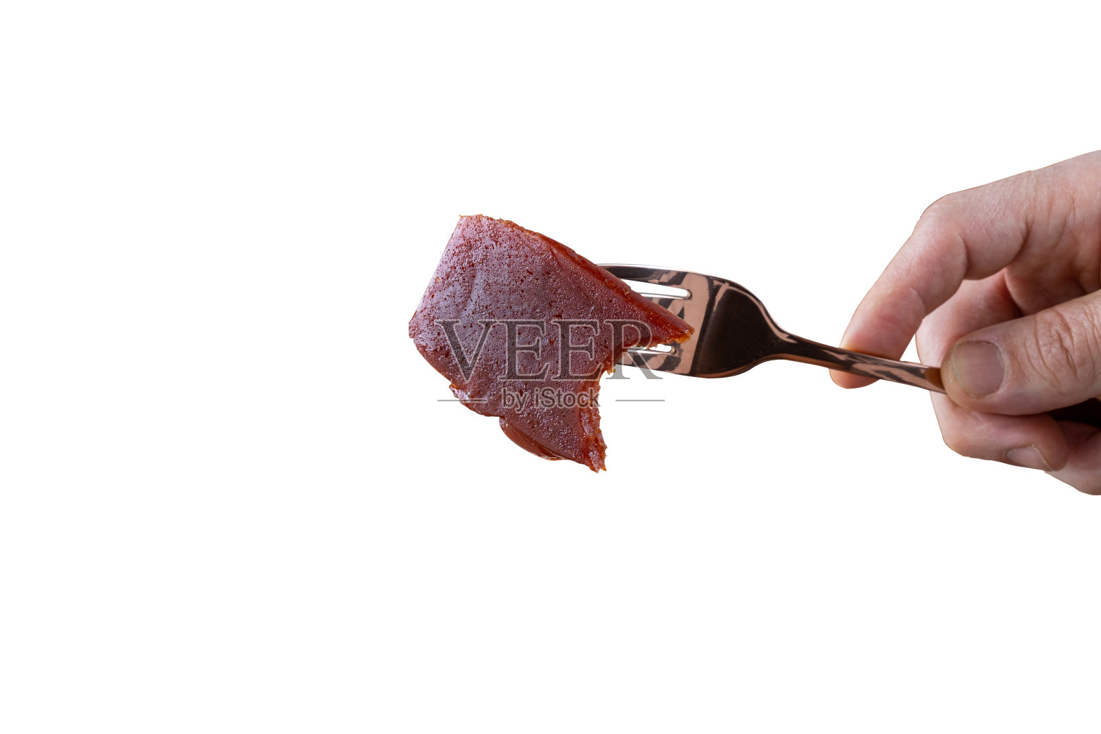 特写的甜番石榴片与咬白的背景。照片摄影图片